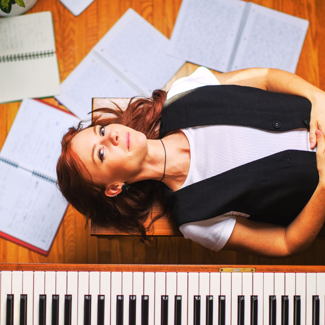 Orange piano laying down